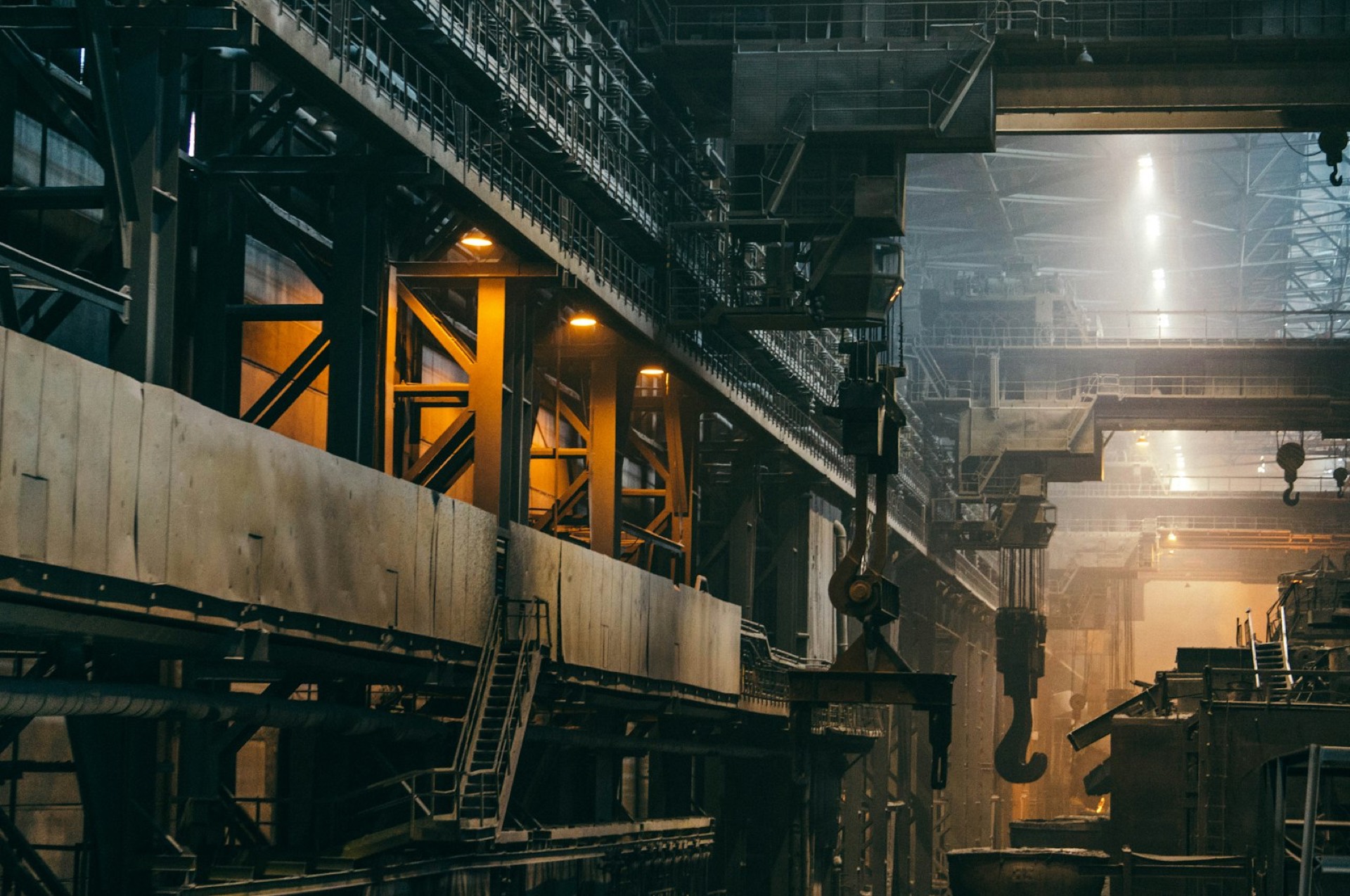 A heavy engineering shop floor with an overhead gantry.