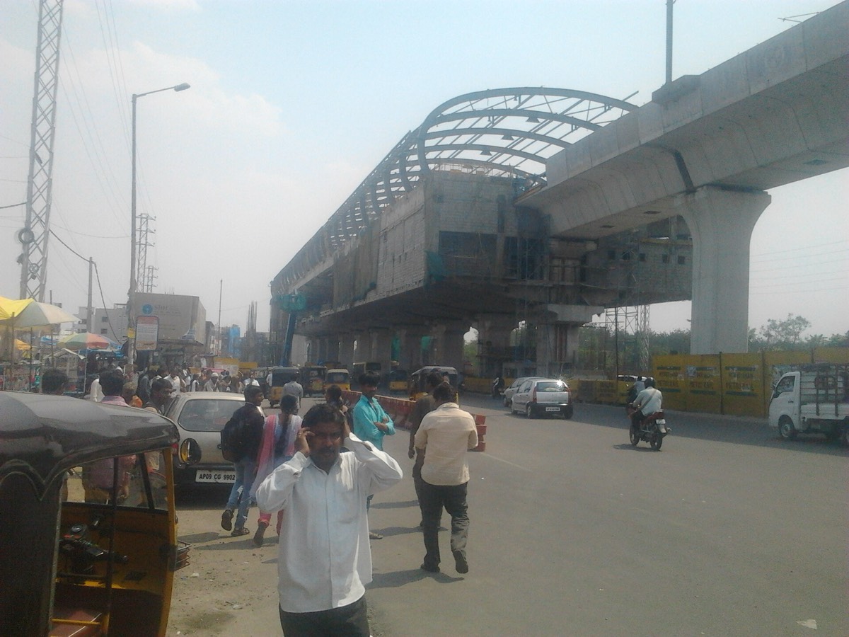A street in Uppal, Hyderabad, under the metro viaduct.
